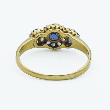 Victorian 18 Karat Royal Blue Sapphire and Diamond Three Stone Cluster Ring