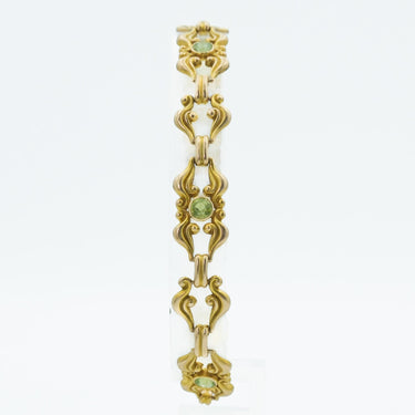 Art Nouveau 14 Karat Yellow Gold Scroll Link and Green Gemstone Bracelet