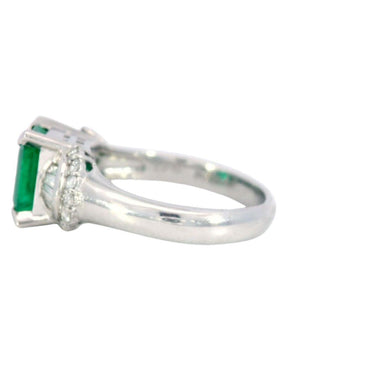 Vintage Classic Emerald and Diamond Solitaire Platinum Engagement Ring