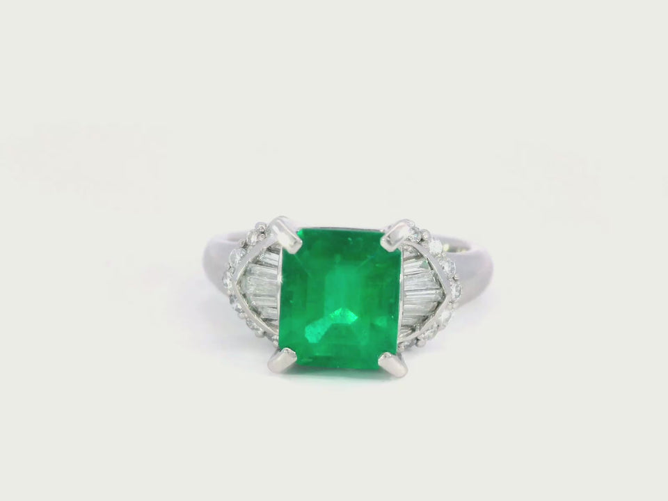 Vintage Classic Emerald and Diamond Solitaire Platinum Engagement Ring