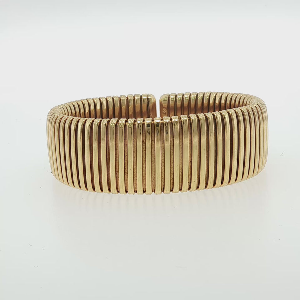 Vintage Bulgari Tubogas Cuff bracelet 18K Yellow Gold by Carlo Weingrill