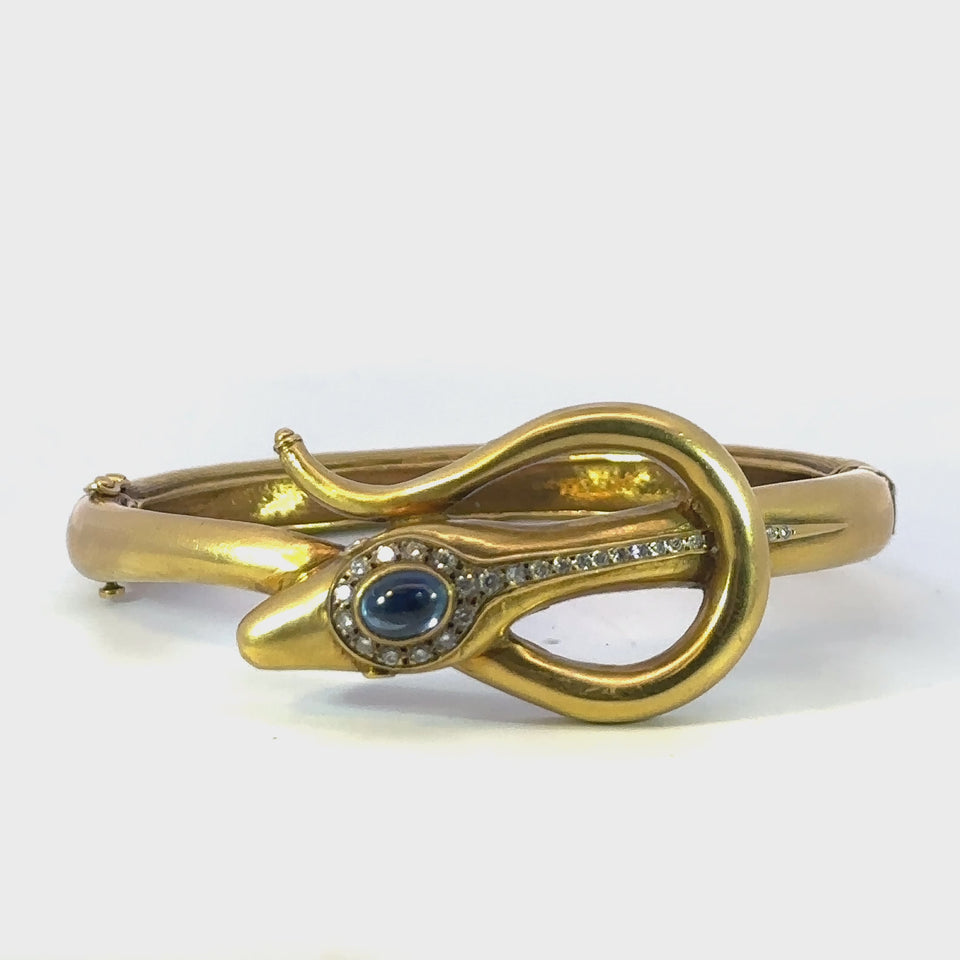 Vintage Snake with Sapphires and Diamonds Bangle Bracelet in 14 Karat Gold