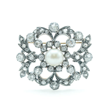 Edwardian 10 Karat White Gold and Silver Topped Diamond and Pearl Brooch